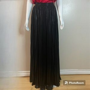 Metallic black pleated evening maxi skirt with high side slit